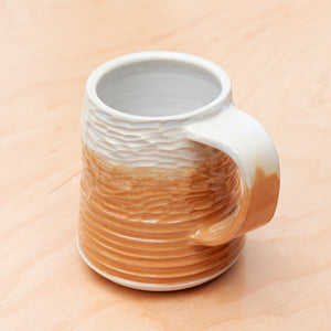 Saturn Carved Stein in Sandstone