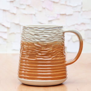 Saturn Carved Stein in Sandstone